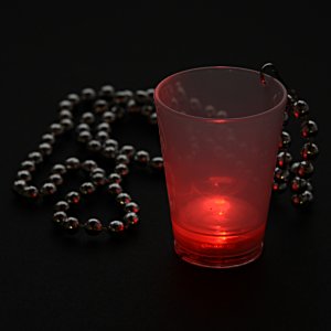 Additional Image 4 - a red candle in a plastic cup with a bead necklace