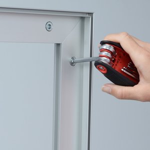 Additional Image 3 - a hand holding a screwdriver