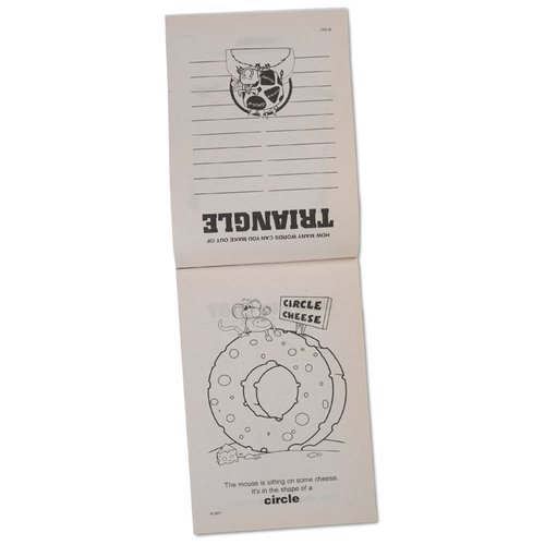 Additional Image 2 - a white remote control with a round button