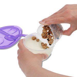 Additional Image 5 - a person holding a piece of food