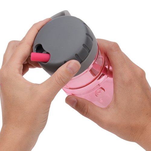 Additional Image 3 - a person holding a pink bottle