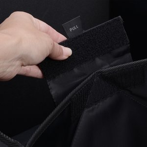 Additional Image 2 - a hand holding a black jacket