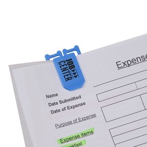 Additional Image 2 - a blue clip on a white paper