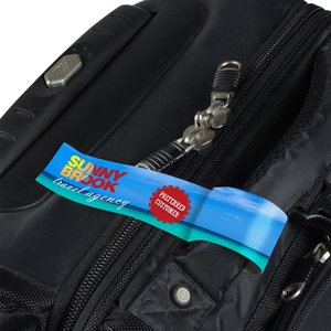 Additional Image 2 - a black suitcase with a blue tag