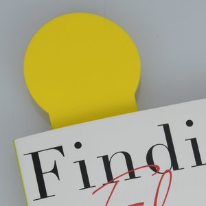 Additional Image 1 - a yellow pin on a white surface