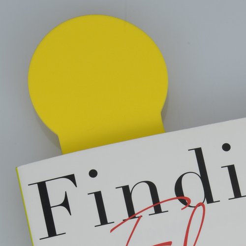 Additional Image 1 - a yellow pin on a white surface