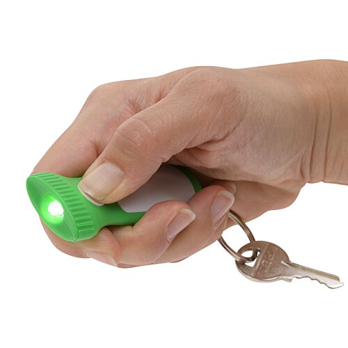 Additional Image 2 - a hand holding a green flashlight