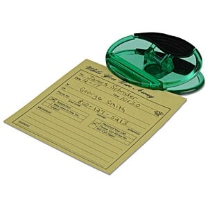 Additional Image 2 - a yellow piece of paper with a green and black stamp