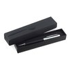 a black pen in a black box