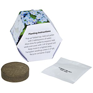 Additional Image 1 - a small cube with a round object next to a piece of paper