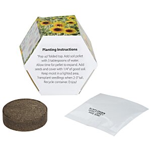 Additional Image 2 - a small hexagon shaped box with a brown circle and a white square