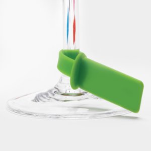 Additional Image 4 - a green plastic clip on a clear glass