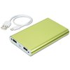 a green power bank with a white cord