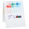 a white card with colorful squares