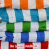 a stack of colorful pillows