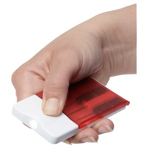 Additional Image 1 - a hand holding a red card