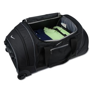 Additional Image 6 - a black bag with a green object inside