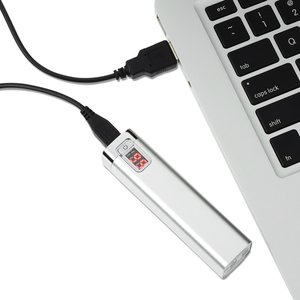 Additional Image 3 - a white usb cable next to a laptop