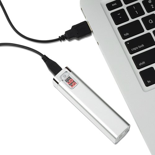 Additional Image 3 - a white usb cable next to a laptop