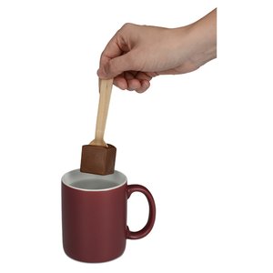 Additional Image 1 - a hand holding a brown container