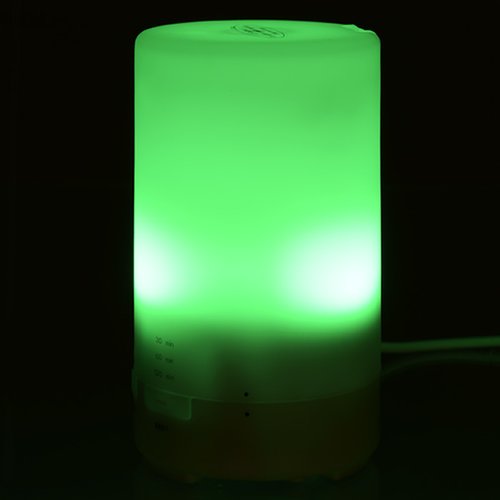 Additional Image 4 - a green candle in the dark