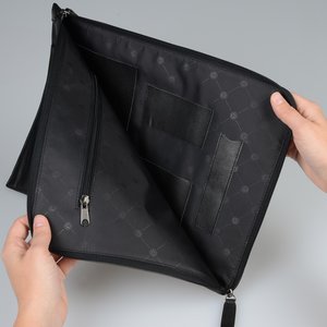 Additional Image 1 - a person holding a black graduation cap