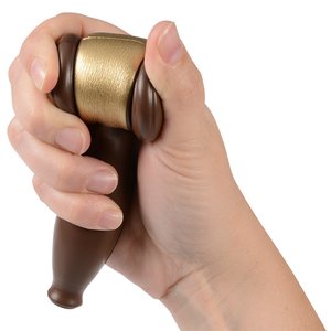 Additional Image 1 - a hand holding a brown and gold object