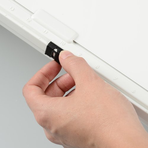 Additional Image 6 - a hand holding a black marker