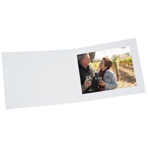 Additional Image 1 - a rectangular white paper with a picture of a couple of people