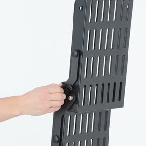 Additional Image 1 - a person holding a black object