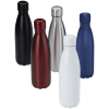 a group of different colored bottles