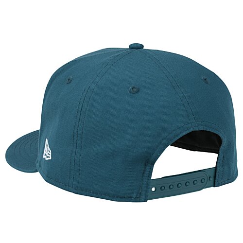 Additional Image 1 - a blue hat with a hole in the back