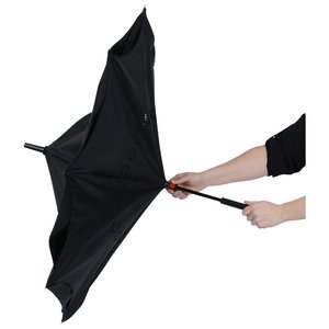 Additional Image 4 - a person holding a black umbrella