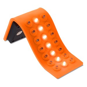 Additional Image 4 - an orange object with white dots