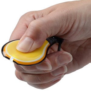 Additional Image 1 - a hand squeezing a yellow object