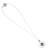 a white necklace with a black circle on it