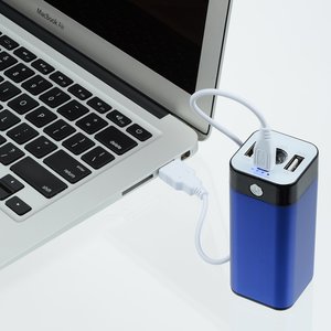 Additional Image 3 - a blue battery next to a laptop