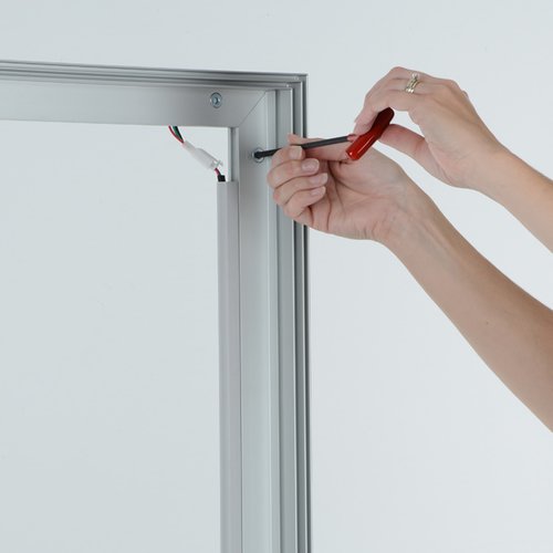 Additional Image 1 - a person holding a screwdriver