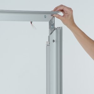 Additional Image 2 - a person holding a metal bar