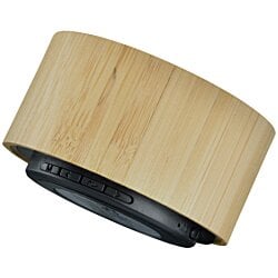 a wooden cylinder with a black rim