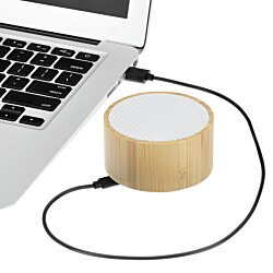 a roll of tape connected to a laptop