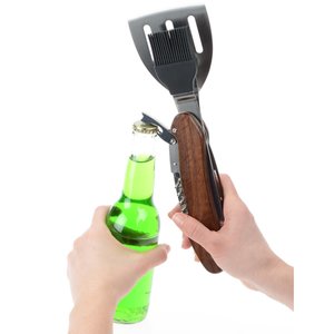 Additional Image 4 - a hand holding a bottle and a shovel