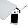 a cell phone next to a laptop