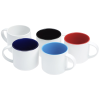 a group of white mugs with different colors of paint
