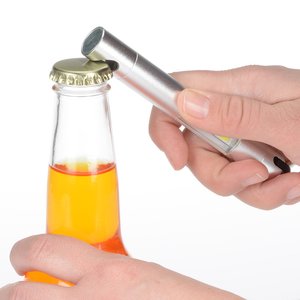 Additional Image 4 - a person holding a bottle of orange liquid