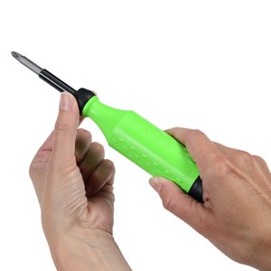 Additional Image 4 - a hand holding a green screwdriver
