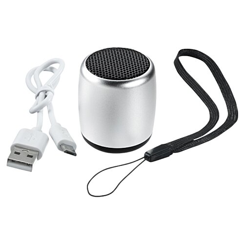 Additional Image 1 - a black cell phone and a silver cylinder
