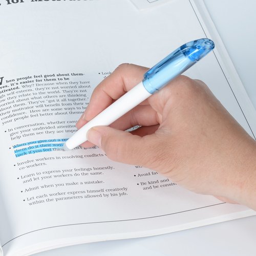 Additional Image 1 - a hand holding a pen