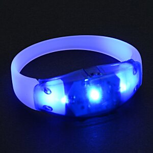 Additional Image 3 - a blue light on a wristband