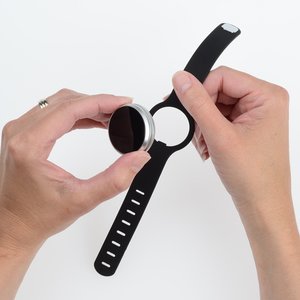 Additional Image 5 - a person holding a black watch